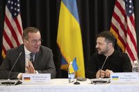 Ukrainian President Volodymyr Zelenskyy, right, and German Defence Minister Boris Pistorius