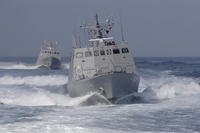 Two Kuang Hua VI-class missile boats are seen during a simulated attack drill off Kaohsiung City