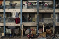 Displaced Palestinians live in a school run by UNRWA, the U.N. agency helping Palestinian refugees, west of Gaza City.