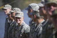 Maj. Lisa Jaster, center, the first Army Reserve female to graduate the Army's Ranger School