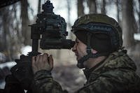 A Ukrainian serviceman prepares to fire a M777 howitzer towards Russian positions at the frontline near Donetsk.