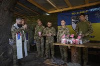Ukrainian servicemen attend an Easter service
