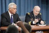 Defense Secretary Chuck Hagel, left, and U.S. Army Gen. Martin E. Dempsey, the chairman of the Joint Chiefs of Staff, conduct a news briefing at the Pentagon in Arlington, Va.