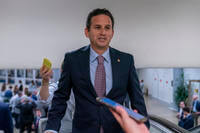 Sen. Brian Schatz, D-Hawaii, speaks with reporters