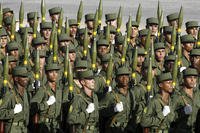 Cuban soldiers march during a military parade.