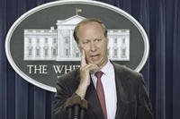David Gergen answers a reporter's question in the briefing room of the White House.