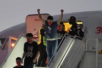 Migrants arrive at Simon Bolívar International Airport in Maiquetia, Venezuela.