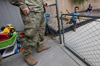 Army Sgt. Anthony Castorina arrives Thursday evening to pick up son, Barrett, at the civilian child care center in Colorado Springs that the family turned to when they couldn’t get a spot on base at Fort Carson.