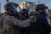 U.S. Marines guard a federal area in Los Angeles