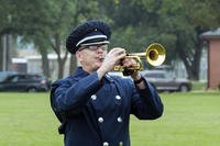 U.S. Air Force Staff Sgt. Daniel Thrower, Heartland of America Band hornist, plays ‘Taps’ during a remembrance ceremony at Offutt Air Force Base, Nebraska.