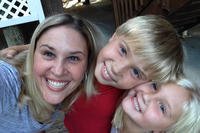 Heather Sweeney and her 2 children are outside the apartment they moved into after her divorce.