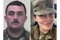 National Guard members, from left, Staff Sgt. Andrew Wolfe and Specialist Sarah Beckstrom