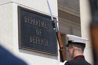 A U.S. Marine stands as part of an honor cordon for the arrival of NATO Secretary General Jens Stoltenberg at the Pentagon, Monday, June 7, 2021, in Washington. (AP Photo/Alex Brandon)