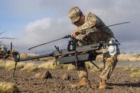 U.S. Army Pfc. Isaiah Stamper from Bravo Detachment, 125th Intelligence and Electronic Warfare Battalion, 25th Infantry Division Artillery Brigade, 25th Infantry Division, assembles a Ghost-X reconnaissance drone during the Joint Pacific Multinational Readiness Center Rotation 26-01 on Pohakuloa Training Area, Hawaii, Oct. 29, 2025. (U.S. Army photo by Pfc. Jose Nunez)