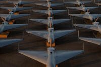 Low-cost Unmanned Combat Attack System (LUCAS) drones are positioned on the tarmac at a base in the U.S. Central Command (CENTCOM) operating area, Nov. 23. (U.S. Central Command Public Affairs)