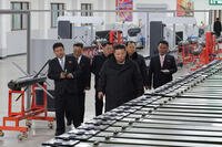 North Korea's leader Kim Jong Un visits a major munitions factory.
