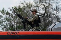 A U.S. Coast Guard member is seen during a visit by U.S. Secretary of Homeland Security Kristi Noem on Wednesday, Jan. 7, 2026, in Brownsville, Texas. (AP Photo/Gabriel V. Cardenas)
