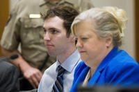 Tyler Robinson, accused in the fatal shooting of Charlie Kirk, sits beside defense attorney Kathryn Nester during a hearing in 4th District Court in Provo, Utah, on Friday, Jan. 16, 2026. (Bethany Baker/The Salt Lake Tribune via AP, Pool)