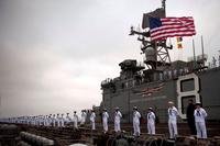 Sailors man the rails aboard the amphibious assault ship USS Makin Island (LHD 8) as the ship returns to San Diego, June 22, 2012 following a seven-month maiden deployment. (U.S. Navy photo/Dominique Pineiro)