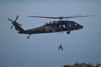 A UH-60 Black Hawk helicopter hoists a tactical air control party airman during a training exercise in New Jersey on Nov. 18, 2016. (U.S. Air National Guard photo/Matt Hecht)