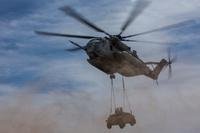 A U.S. Marine Corps CH-53E Super Stallion lifts a Humvee during a CH-53 tactics exercise at Auxiliary Airfield 2, Yuma, Ariz., April 7, 2017. (U.S. Marine Corps photo/Michaela R. Gregory)