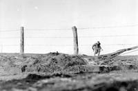 Infantryman goes out on a one-man sortie, covered by a buddy in the background. 82nd Airborne Division, Belgium. Dec. 24, 1944. (Photo: National Archives)