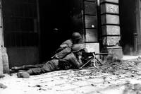 A GI machine-gun crew in the streets of Aachen, Germany, Oct. 15, 1944. (U.S. Army photo)