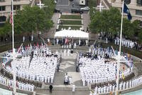 A sea of white uniforms greets visitors to the Navy Memorial in Washington, D.C as Sailors pause to celebrate the 73rd anniversary of the Battle of Midway. (U.S. Navy photo by Mass Communication Specialist 2nd Class Eric Lockwood/Released)