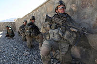U.S. Army soldiers with Charlie Troop, 3rd Squadron, 89th Cavalry, 4th Infantry Brigade Combat Team, 10th Mountain Division wait for the order to move against enemy positions in Charkh, Logar province, Afghanistan, on Nov. 13, 2010. (Sgt. Sean P. Casey)