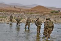 Task Force Arrowhead Soldiers make their way back across the Arghandab River in the Mizan district of southern Afghanistan under the watchful eyes of their fellow Soldiers, Sept. 5, 2012.. (Photo Credit: Sgt. Matt Young)