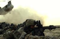 Rangers with the 1st Battalion, 75th Ranger Regiment lay prone while a CH-47 Chinook helicopter comes in to extract them from an operation in Ghazni Province, Afghanistan in February 2012. (Photo: U.S. Army)