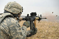 A U.S. Army soldier fires an M4. Army photo