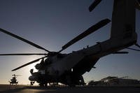 A CH-53E Super Stallion with Marine Heavy Helicopter Squadron 466 waits on the flightline as aircrew Marines conduct preflight checks at Marine Corps Station Miramar, Calif., Sept. 16. Photo By: Sgt. Lillian Stephens