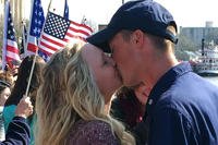 Petty Officer 3rd Class Philip Wert reunites with his fiancée during the Cutter Diligence homecoming March 5, 2016 in Wilmington, North Carolina. (U.S. Coast Guard photo: Mary Ann Holmes/Atlantic Area Ombudsman)