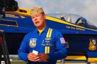 Captain Greg McWherter, Blue Angels #1 and squadron commander is interviewed by local media shortly after arriving at Dobbins Air Reserve Base Oct. 14. (U.S. Air Force photo/ Brad Fallin)