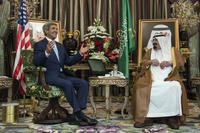 Saudi King Abdullah bin Abdul Aziz al-Saud listens to U.S. Secretary of State John Kerry before a meeting Sept. 11, 2014, at the Royal Palace in Jiddah. Key Arab allies promised to &quot;do their share&quot; to fight Islamic State militants. Brendan Smialowski/AP