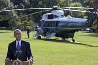 President Barack Obama speaks about the participation of five Arab nations in airstrikes against militants in Syria., Tuesday, Sept. 23, 2014, on the South Lawn the White House, in Washington. (AP Photo/Carolyn Kaster)