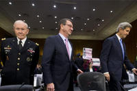 Gen. Martin Dempsey, Defense Secretary Ash Carter, and Secretary of State John Kerry, arrive on Capitol Hill, Wednesday, March 11, 2015, to testify before the Senate Foreign Relation Committee. (AP Photo/Pablo Martinez Monsivais)