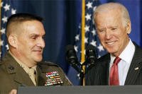 Major General Frederick Padilla greets Vice President Biden after introducing the vice president for his speech about U.S. policy in Iraq, Thursday, April 9, 2015, at the National Defense University in Washington. (AP Photo/Jacquelyn Martin)
