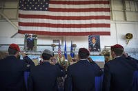 Airmen salute during Capt. Matthew D. Roland and Staff Sgt. Forrest B. Sibley’s memorial service, Sept. 14, 2015, at Hurlburt Field, Fla. (U.S. Air Force/Senior Airman Ryan Conroy)