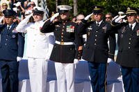 Airmen, Sailors, Marines, and Soldiers salute during the presentation of the colors at the 47th annual Explosive Ordnance Disposal Memorial Service at Eglin Air Force Base, Fla., May 7, 2016. (U.S. Air Force photo/Samuel King Jr.)