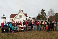 Coast Guard members from Civil Engineering Unit Providence and their family members attend a Friends of Flying Santa event at Warwick Lighthouse, R.I., Sunday, Dec. 13, 2015. (U.S. Coast Guard/PO3 Andrew Barresi)