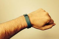 Steve Whitman shows off his FitBit Flex wristband.