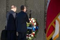 Defense Secretary Ash Carter, right, and Veterans Affairs Secretary Bob McDonald lay a wreath at the Vietnam Veterans Memorial in Washington, D.C., March 29, 2016. (Photo by Tim D. Godbee/U.S. Navy)