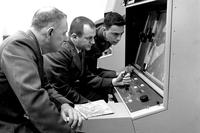 Strategic Air Command personnel interpret a reconnaissance photo during the Cuban Missile Crisis in October 1962. (U.S. Air Force photo)