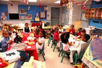 Making crafts, dancing and having a good time with their parents help the children burn off some of the energy created by their meal. (Photo Credit: Mr. Kevin Stabinsky (IMCOM)