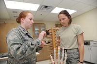 Airman occupational therapist in consultation.
