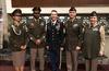 Four soldiers and Sergeant Major of the Army Dan Dailey display the "pinks and greens" uniform prototypes on Capitol Hill, February 1, 2018. (U.S. Army)