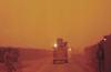 John Thampi’s convoy drives through a sandstorm in Iraq in 2007
