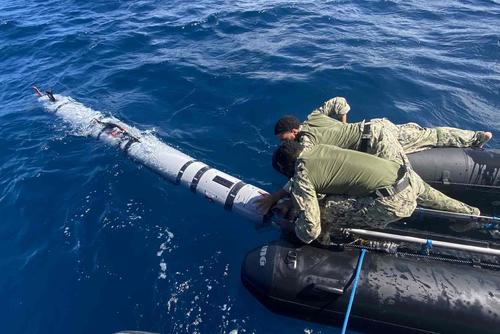 Sailors recover a Mk-18 Mod 2 unmanned underwater vehicle